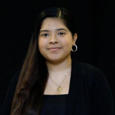 Young woman smiling.